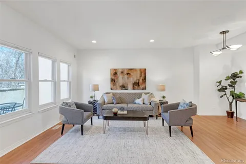 a kitchen with a sink cabinets and window