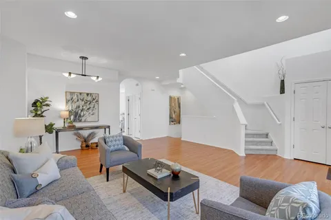 a dining room with a table and chairs