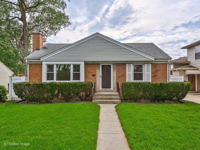 a front view of a house and a yard