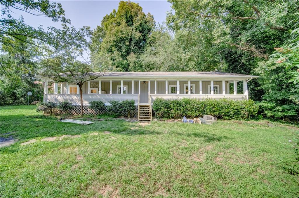 620 High Knoll Road Jasper, GA 30143 - Photo 1 of 1 a house view with a garden space