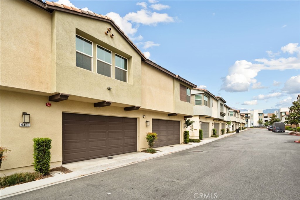 9463 Retreat Place Rancho Cucamonga, CA 91730 - Photo 30 of 37 a view of a street with a building