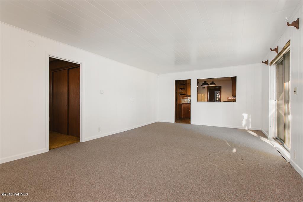 641 Lombard Loop Road Wapato, WA 98951 - Photo 13 of 18 a view of an empty room with a window