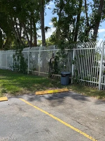 a backyard of a house with trampoline