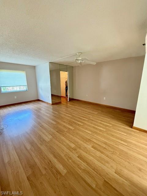3910 Inverrary Boulevard, Unit 407B Lauderhill, FL 33319 - Photo 8 of 28 an empty room with wooden floor and windows