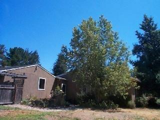 7272 Elphick Road Sebastopol, CA 95472 - Photo 4 of 7 a front view of a house with a yard