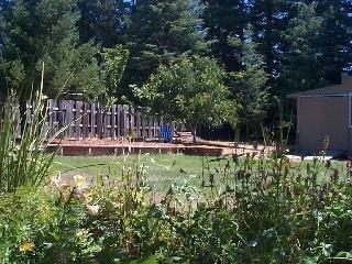 7272 Elphick Road Sebastopol, CA 95472 - Photo 7 of 7 a view of a backyard with plants and a park