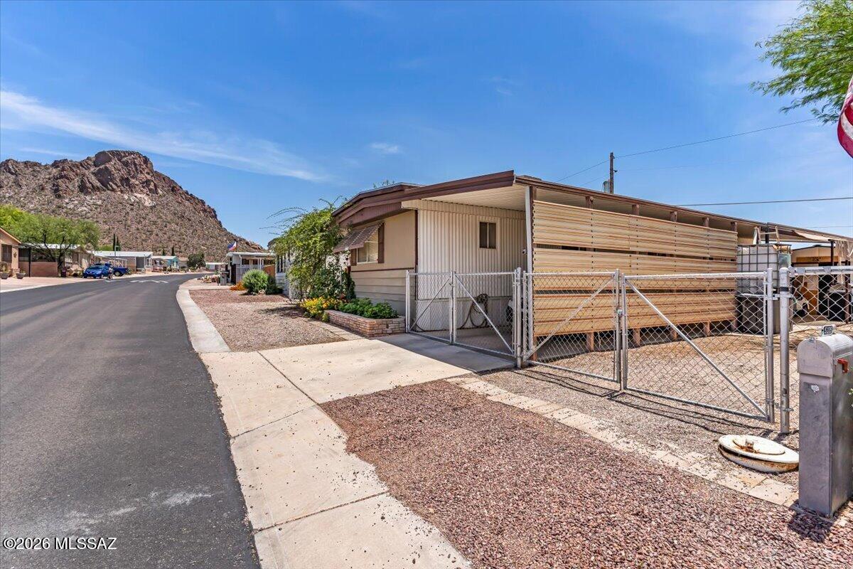 5379 West Rafter Cir Street Tucson, AZ 85713 - Photo 2 of 38 a view of a house with a patio