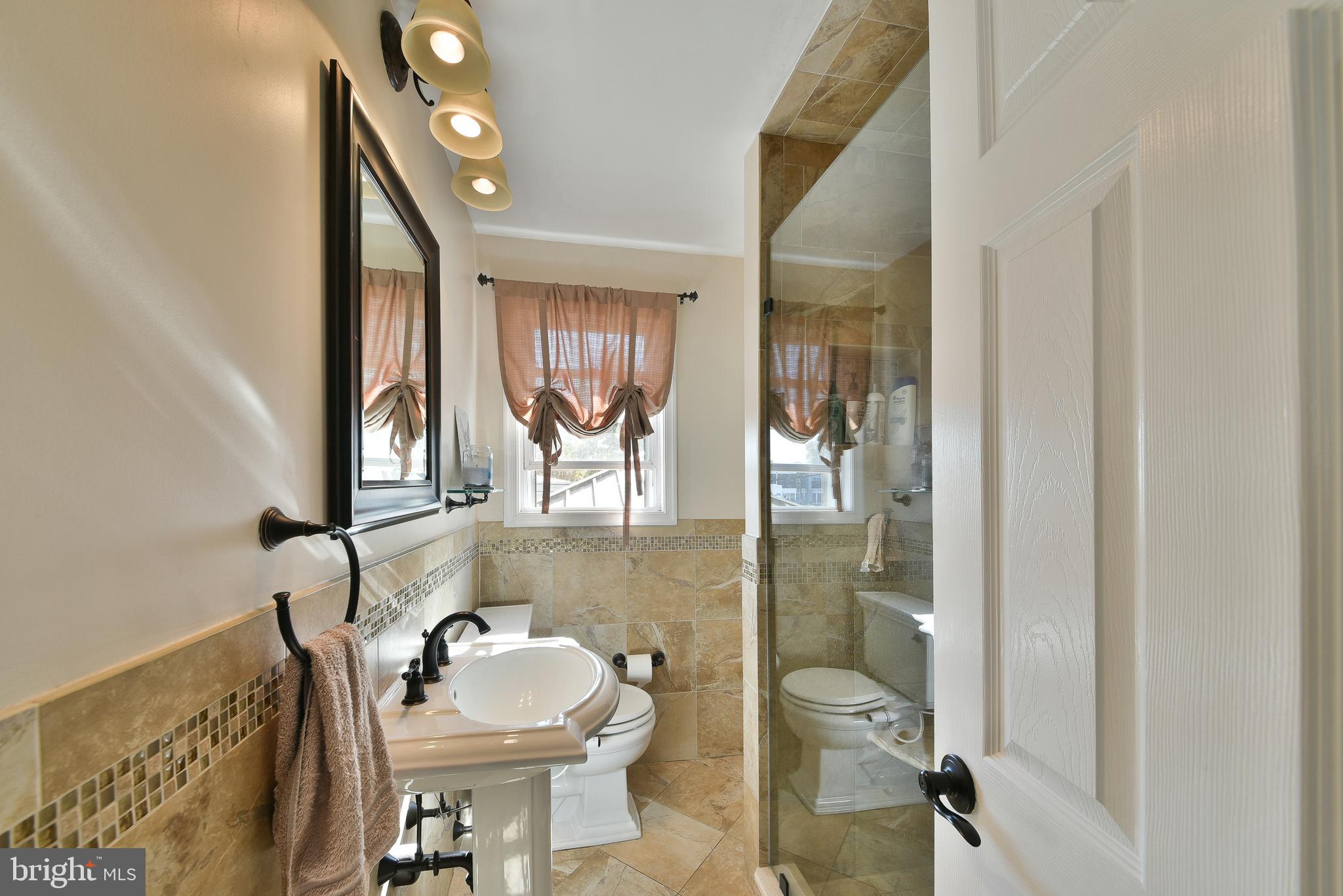 314 Ogden Place Springfield, PA 19064 - Photo 18 of 48 Custom Hall Bath