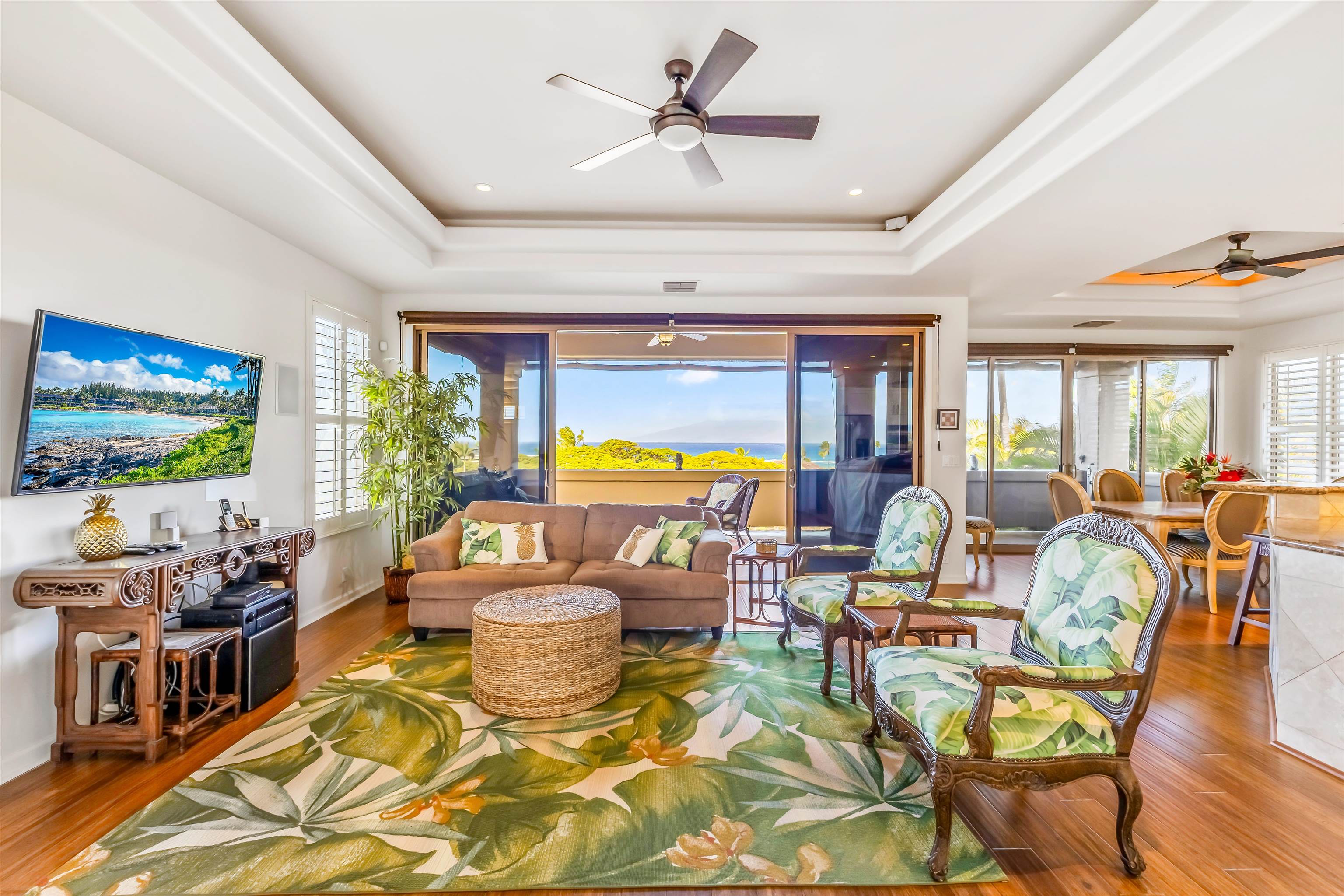 302 Kahana Ridge Drive Lahaina, HI 96761 - Photo 12 of 50 a living room with patio furniture and a flat screen tv
