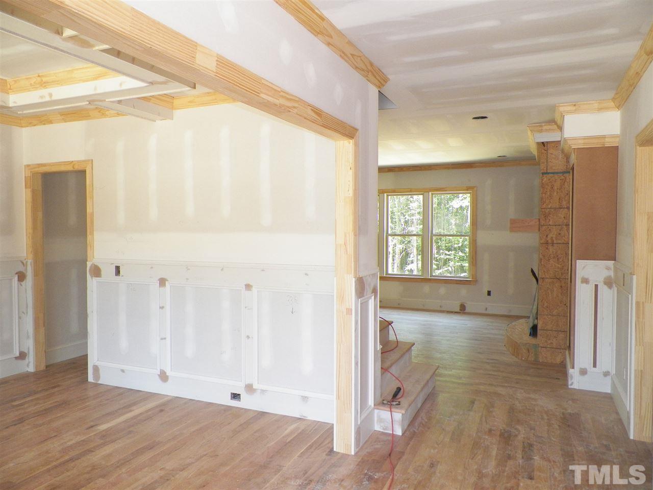 6112 Spring Branch Circle Raleigh, NC 27603 - Photo 3 of 19 a view of an empty room and window
