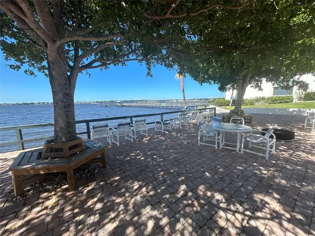 a view of a bench in a backyard