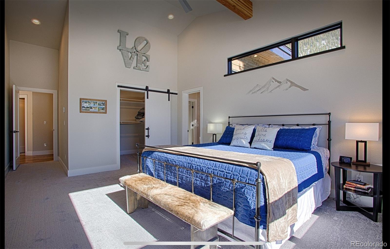 85 Silverheels Road Breckenridge, CO 80424 - Photo 10 of 16 a bed room with a bed and a couch