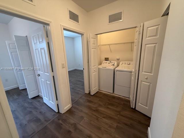 23705 Southwest 117th Court Homestead, FL 33032 - Photo 11 of 22 a view of a livingroom with wooden floor and a hallway