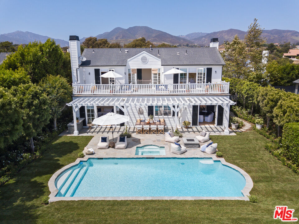 28870 Hampton Place Malibu, CA 90265 - Photo 3 of 53 a view of a house with swimming pool and porch