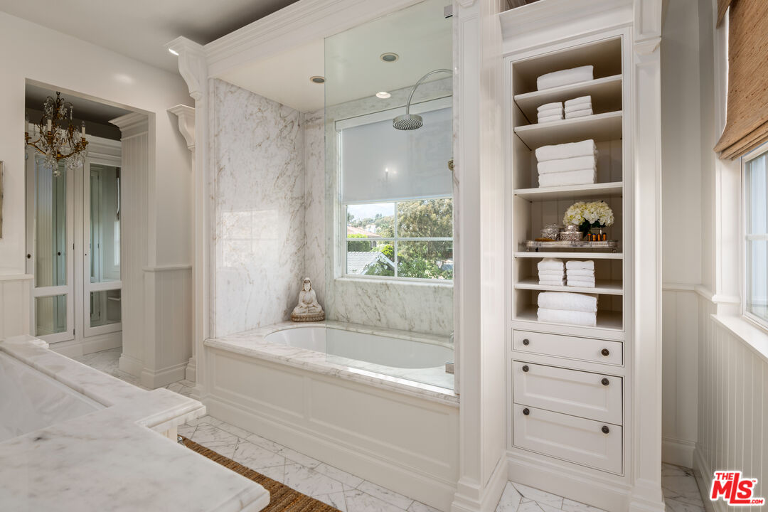 28870 Hampton Place Malibu, CA 90265 - Photo 36 of 53 a bathroom with a bathtub and a shower