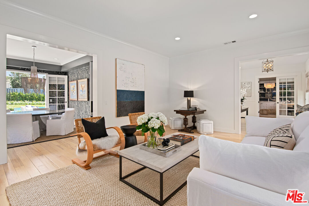 28870 Hampton Place Malibu, CA 90265 - Photo 10 of 53 a living room with furniture and a flat screen tv