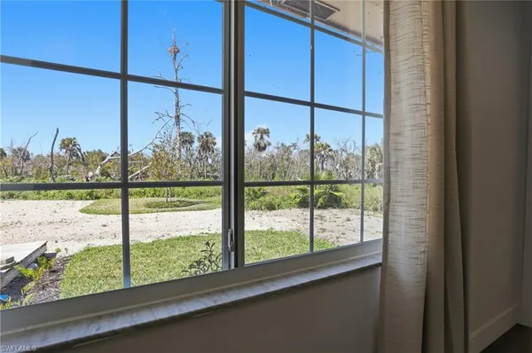 a kitchen with stainless steel appliances granite countertop a refrigerator sink and stove
