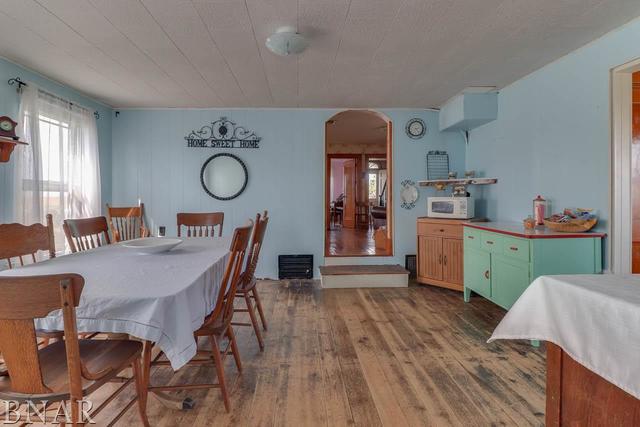 21213 Litwiller Road Delavan, IL 61734 - Photo 2 of 27 a view of a dining room with furniture and wooden floor