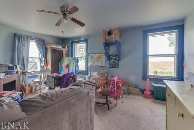 21213 Litwiller Road Delavan, IL 61734 - Photo 12 of 27 a living room with furniture and a window