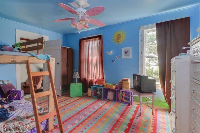 21213 Litwiller Road Delavan, IL 61734 - Photo 13 of 27 a bedroom with furniture and a bed