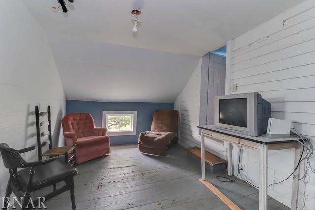 21213 Litwiller Road Delavan, IL 61734 - Photo 15 of 27 a living room with furniture and a flat screen tv