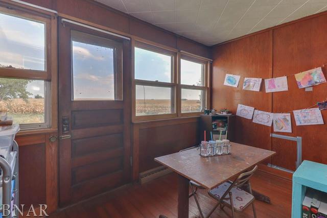 21213 Litwiller Road Delavan, IL 61734 - Photo 19 of 27 a view of a dining room with a table and chairs