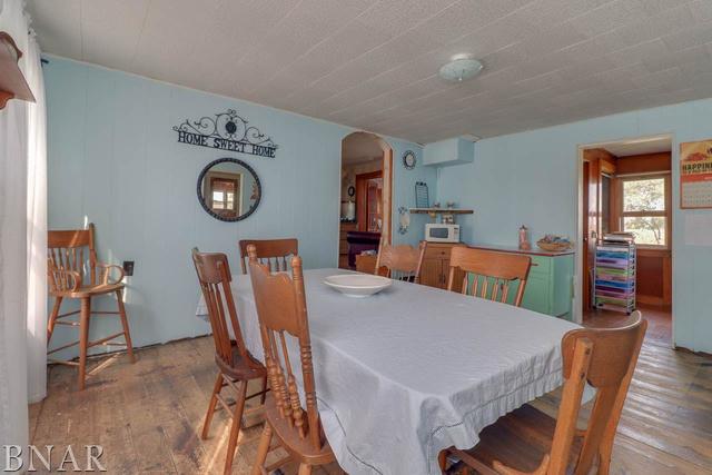 21213 Litwiller Road Delavan, IL 61734 - Photo 3 of 27 a view of a dining room with furniture and wooden floor