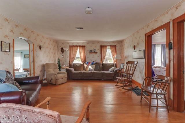 21213 Litwiller Road Delavan, IL 61734 - Photo 5 of 27 a living room with furniture wooden floor and a large window