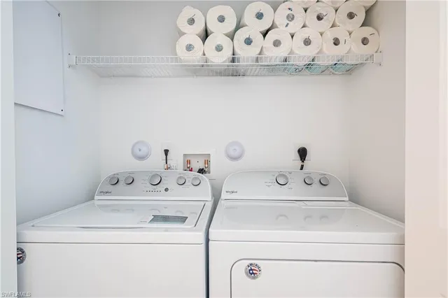 a utility room with dryer and washer