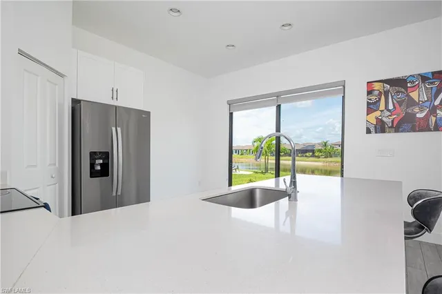 a view of a hallway with a large window