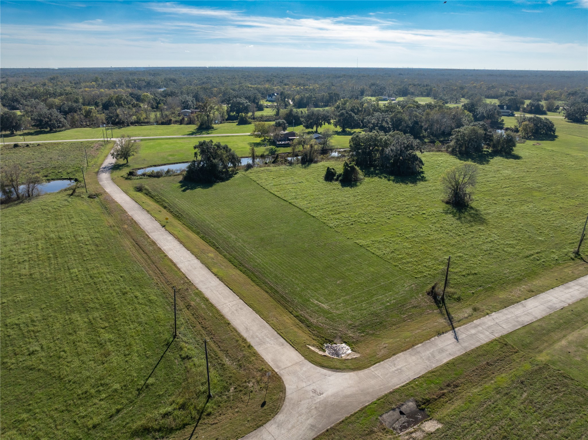 1507 Frontier Trail Angleton, TX 77515 - Photo 16 of 22 a view of a lake from a balcony