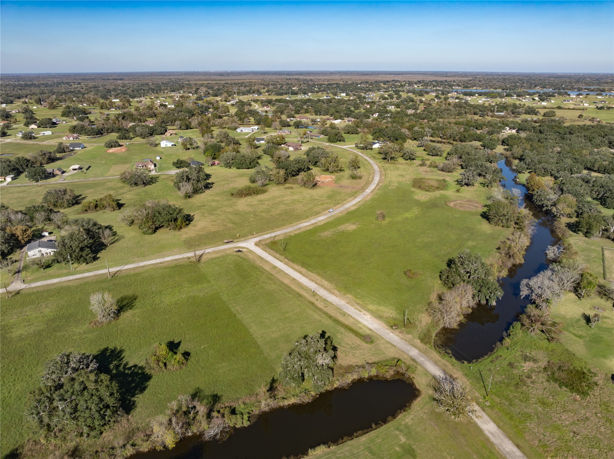 1507 Frontier Trail Angleton, TX 77515 - Photo 3 of 22 an aerial view of residential houses with outdoor space