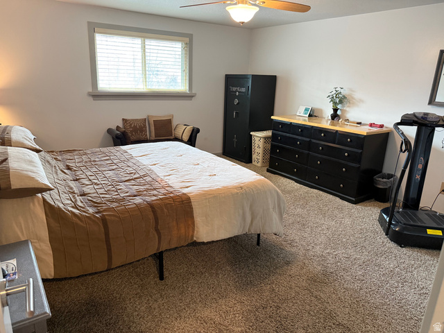 362 East 9150th Street South Sandy, UT 84070 - Photo 25 of 41 Carpeted bedroom featuring ceiling fan