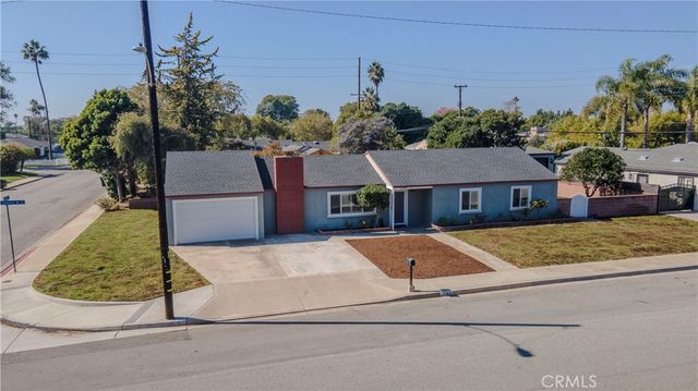 a aerial view of a house with garden