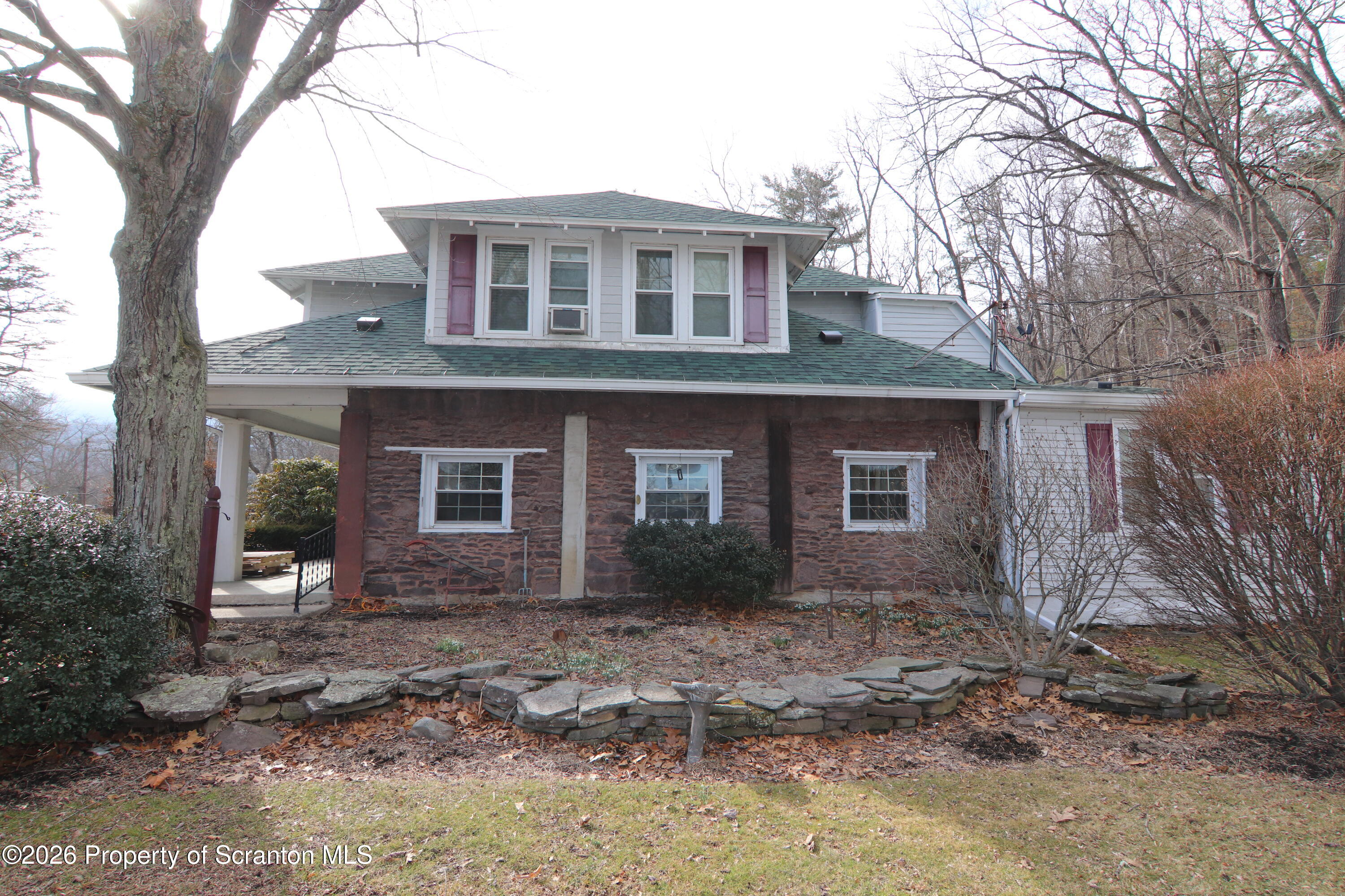 502 State Rte 92 South Tunkhannock, PA 18657 - Photo 37 of 52 a front view of a house with garden