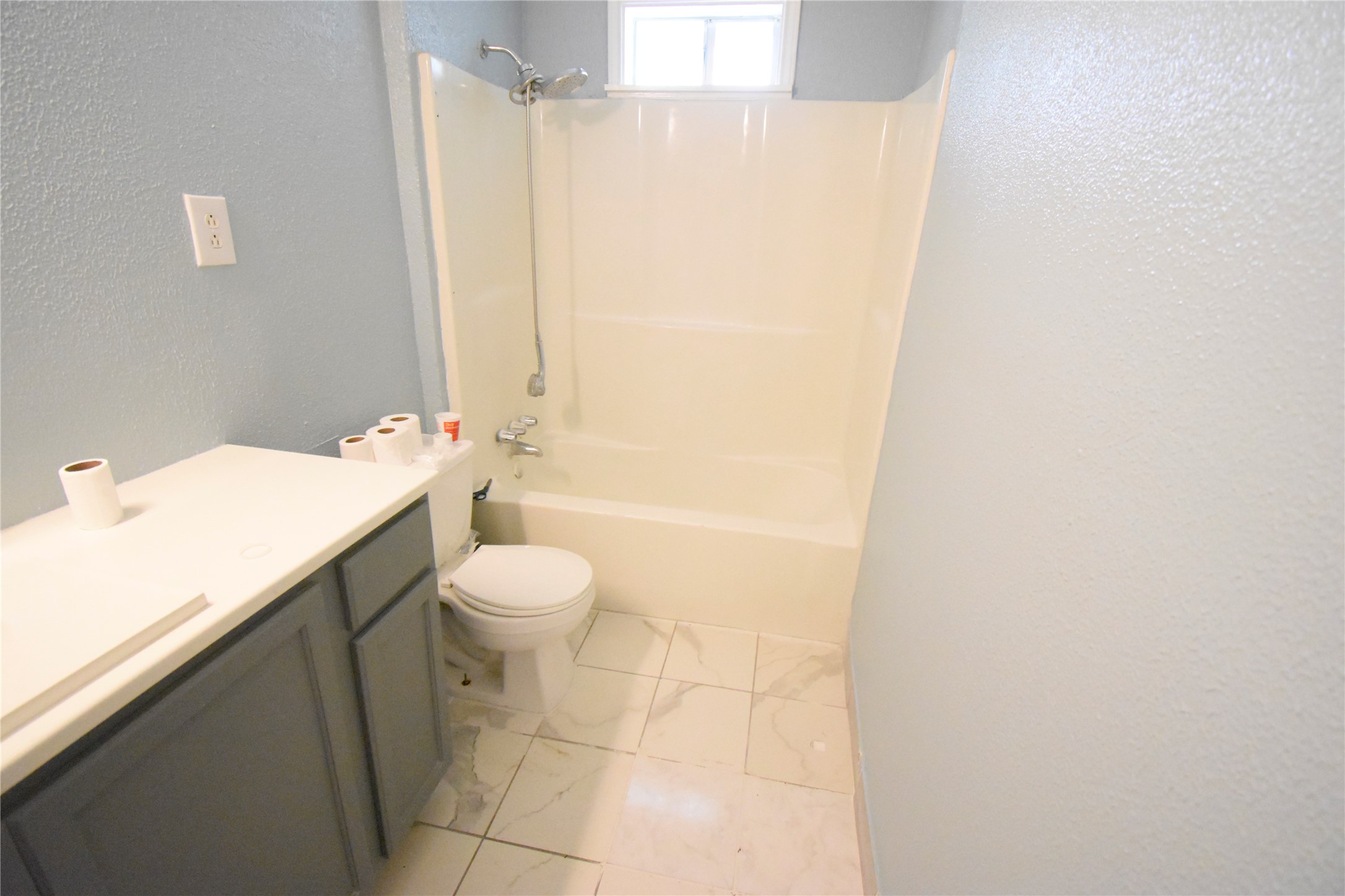 6229 Clover Ridge Street Houston, TX 77087 - Photo 20 of 25 a bathroom with a sink a toilet and shower