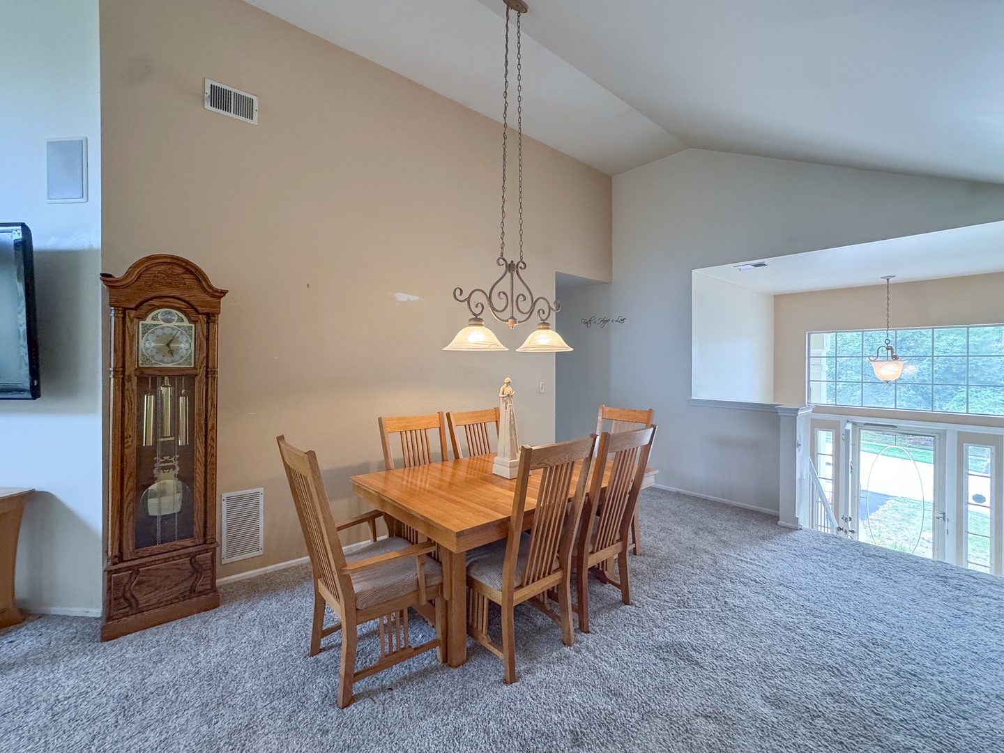 30-w015 Juniper Court, Unit 30W015 Warrenville, IL 60555 - Photo 6 of 14 a dining room with furniture and window