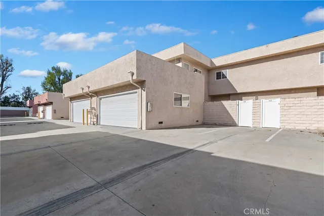 front view of a house with a street