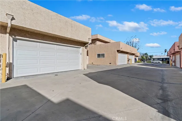 a balcony with palm trees