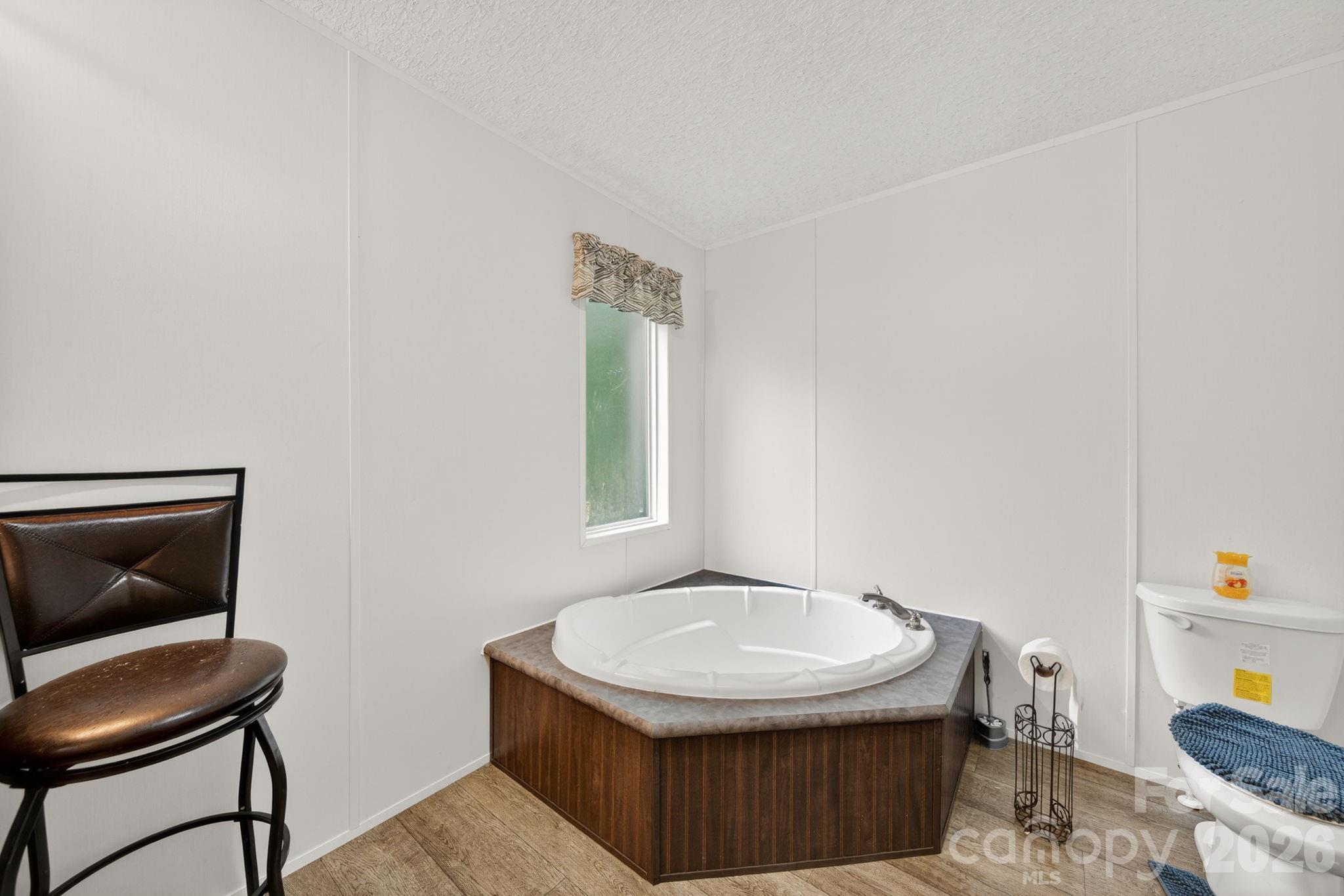 6956 Jamestowne Road Lancaster, SC 29720 - Photo 12 of 36 a view of a room that has a sink and a chair