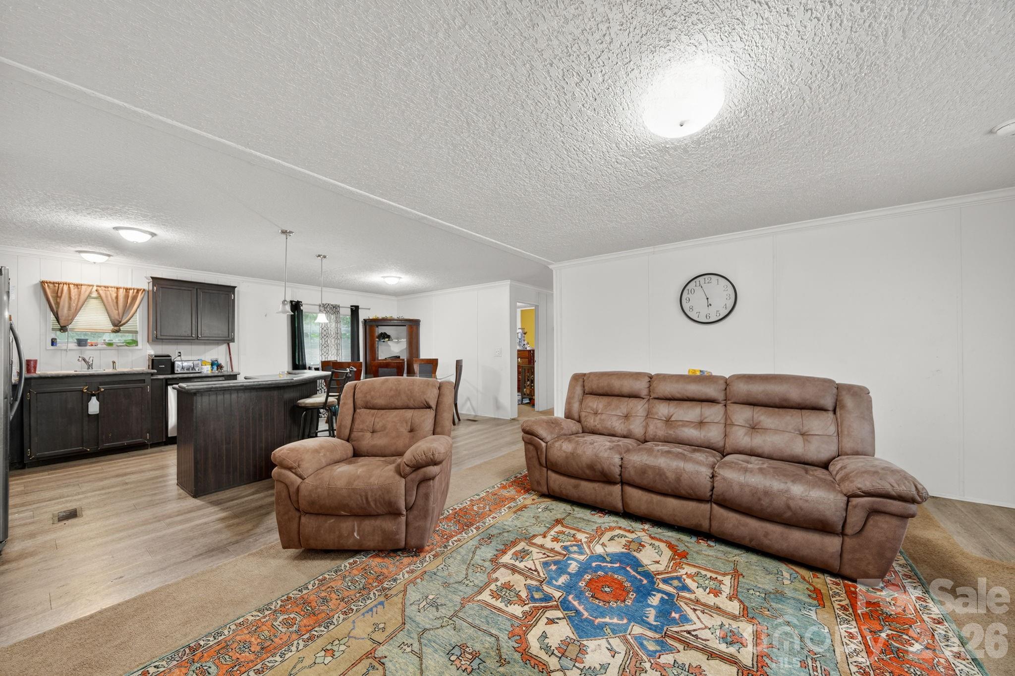 6956 Jamestowne Road Lancaster, SC 29720 - Photo 3 of 36 a living room with furniture and a couch