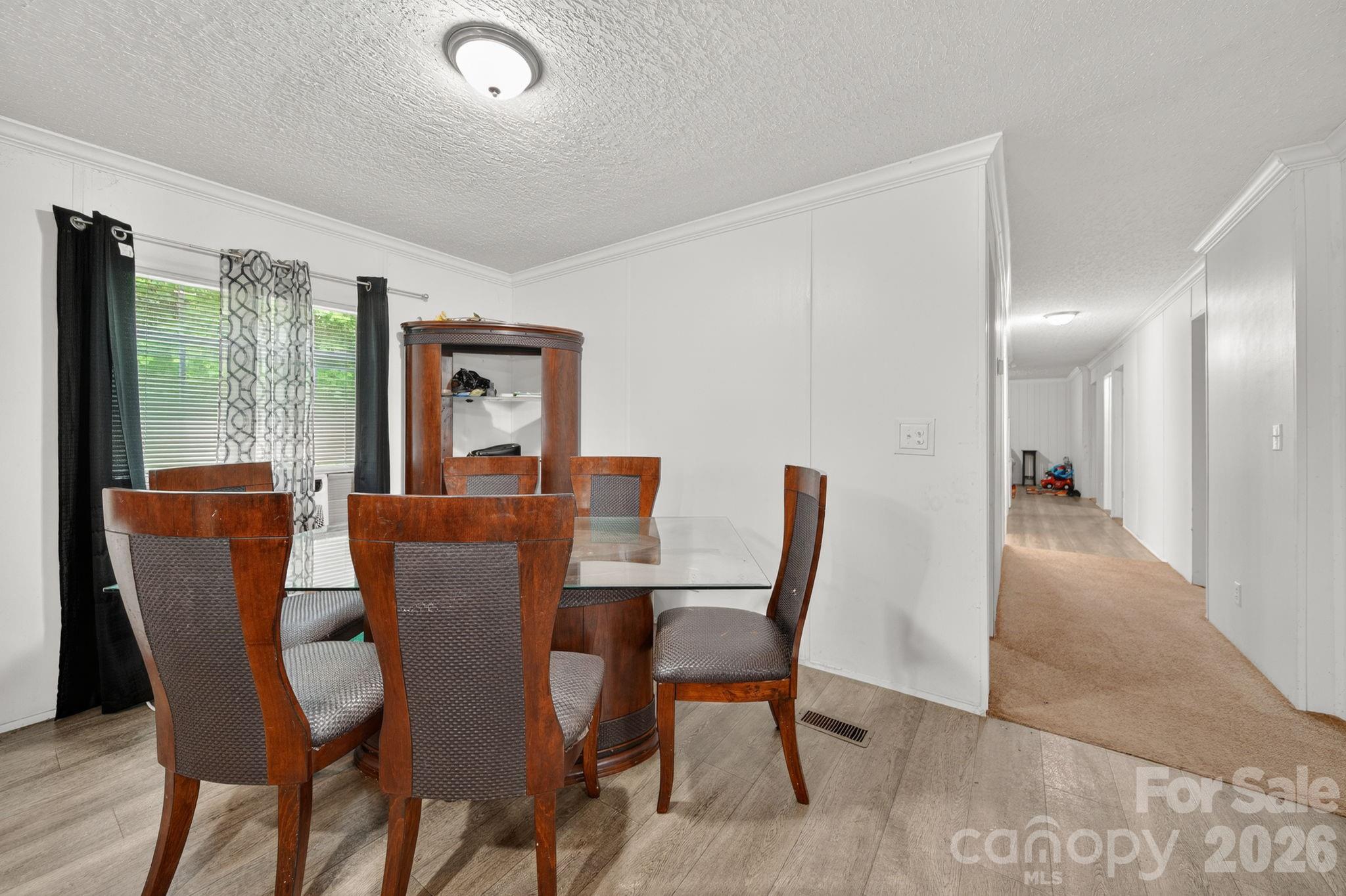 6956 Jamestowne Road Lancaster, SC 29720 - Photo 5 of 36 a view of a dining room with furniture window and outside view