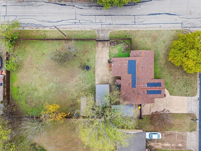 an aerial view of residential house with outdoor space