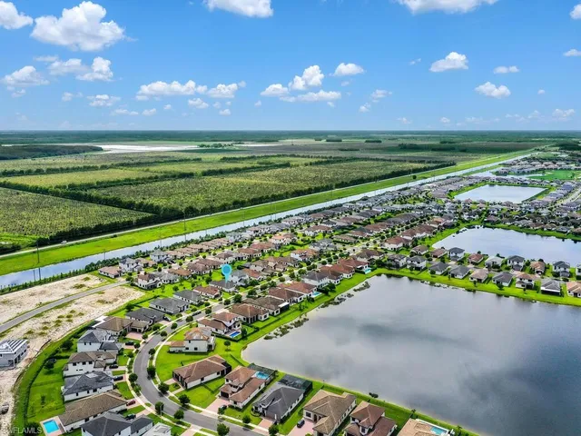 a view of a golf course with a lake
