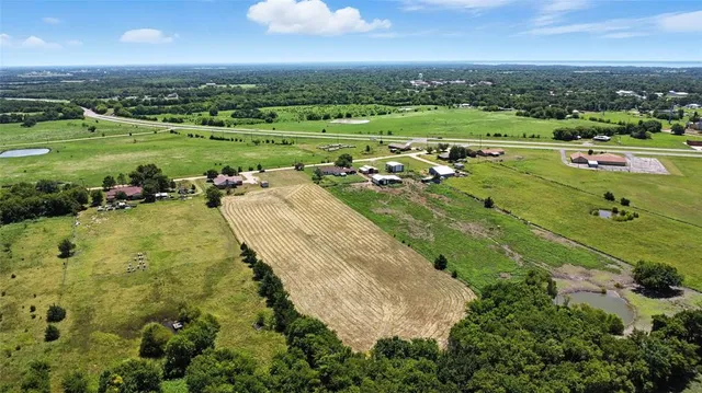 a view of a lake with a city