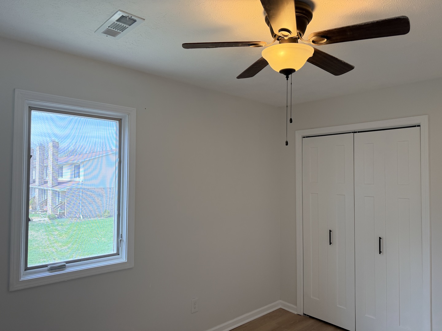 903 North Linden Street, Unit 28 Normal, IL 61761 - Photo 13 of 18 a view of an empty room with a window