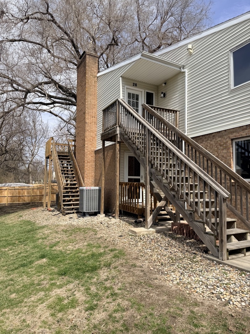 903 North Linden Street, Unit 28 Normal, IL 61761 - Photo 17 of 18 a view of a house with a yard