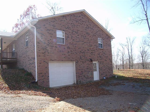 159 Hickory Road Big Rock, TN 37023 - Photo 2 of 20 Side, end view of home. Full unfinished basement for wood burning stove.