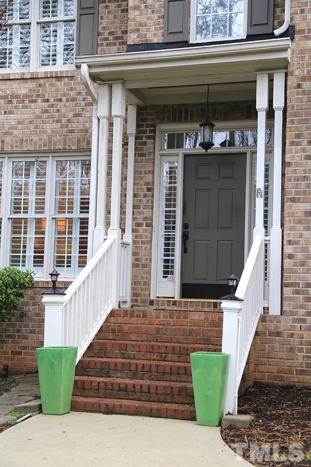 5208 Strathmore Drive Raleigh, NC 27613 - Photo 2 of 30 Brick stairway, covered porch