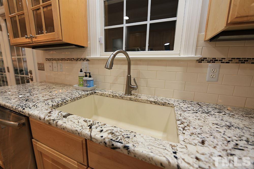5208 Strathmore Drive Raleigh, NC 27613 - Photo 14 of 30 Granite counters, Ceramic tile Backsplash